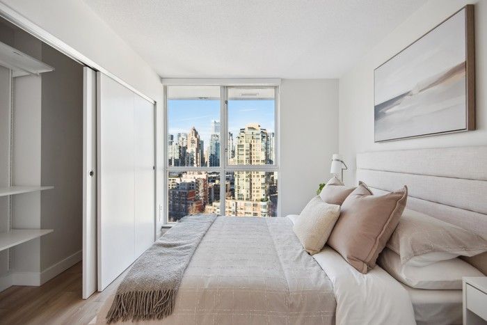  Home has beautiful city and water views from its upper-level corner position.