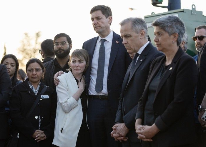 Prime Minister Mark Carney (second right), Premier David Eby (third right) and his wife, Dr. Cailey Lynch, (fourth right) and MLA Mable Elmore (far right) attend a candlelight vigil near the scene where a car drove into a crowd of people during the Lapu Lapu Festival on April 27, 2025 in Vancouver. Prime Minister Mark Carney (second right), Premier David Eby (third right) and his wife, Dr. Cailey Lynch, (fourth right) and MLA Mable Elmore (far right) attend a candlelight vigil near the scene where a car drove into a crowd of people during the Lapu Lapu Festival on April 27, 2025 in Vancouver.