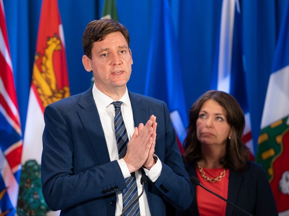  British Columbia Premier David Eby, left, and Alberta Premier Danielle Smith at the Council of the Federation meetings in 2024.