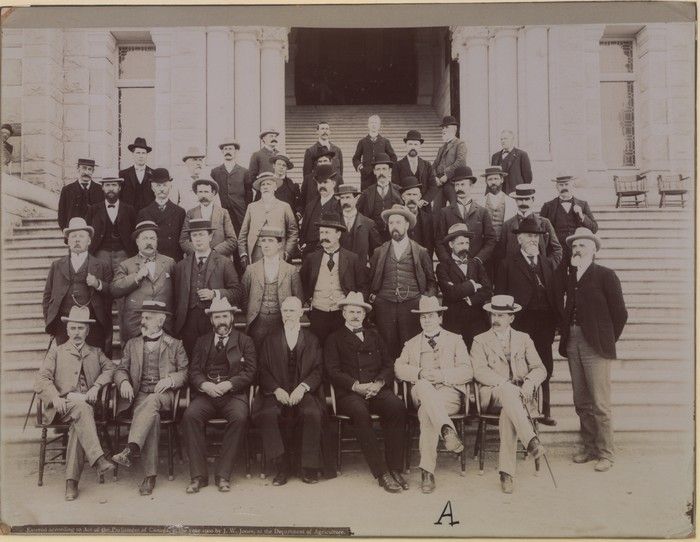 The members of the B.C., 1900. The people in the photo are unidentified, but John Houston looks to be in the top row at the left, wearing a straw hat. The original of this photo seems to be in the B.C. Archives, but this is a print from Wikipedia. The members of the B.C., 1900. The people in the photo are unidentified, but John Houston looks to be in the top row at the left, wearing a straw hat. The original of this photo seems to be in the B.C. Archives, but this is a print from Wikipedia.