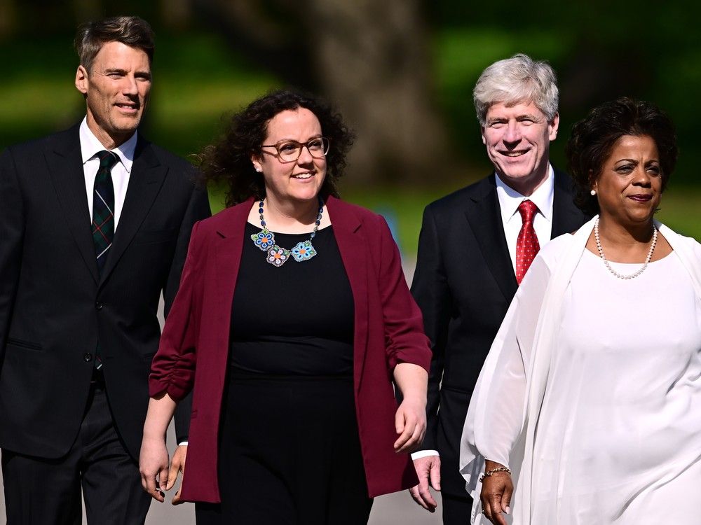 Gregor Robertson, left to right, Rebecca Alty, Tim Hodgson, Marjorie Michel arrive for a cabinet swearing-in at Rideau Hall in Ottawa on Tuesday, May 13, 2025. Gregor Robertson, left to right, Rebecca Alty, Tim Hodgson, Marjorie Michel arrive for a cabinet swearing-in at Rideau Hall in Ottawa on Tuesday, May 13, 2025.