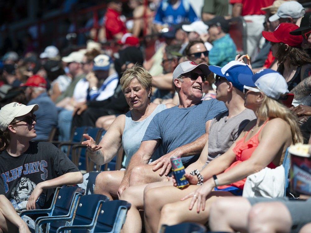 Fans enjoy the warm weather and sunshine during a Vancouver Canadians game at Nat Bailey Stadium.
Fans enjoy the warm weather and sunshine during a Vancouver Canadians game at Nat Bailey Stadium.