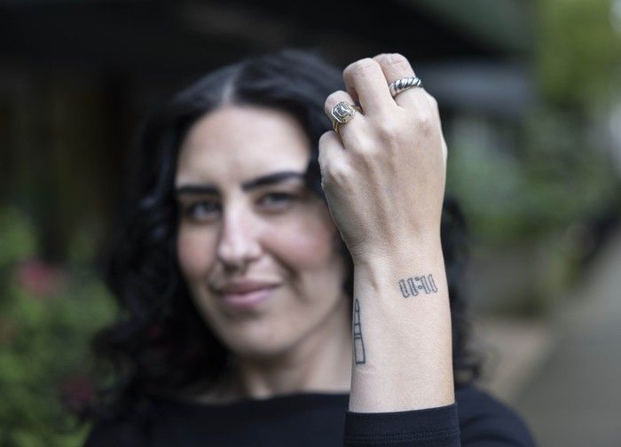  the 11:11 tattoo on kristyne agabob’s left wrist is inspired by numerology and represents a new beginning. she got the body art several years into her recovery, after she was hospitalized and diagnosed with a life-altering eating disorder. photo by jason payne /png