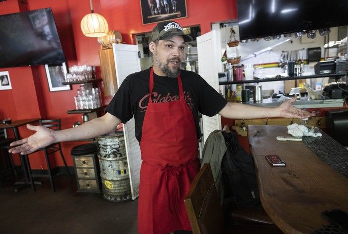Cullin David, co-owner and executive chef of Calabash Caribbean Bistro inside the restaurant on Carrall Street on Thursday. Cullin David, co-owner and executive chef of Calabash Caribbean Bistro inside the restaurant on Carrall Street on Thursday.