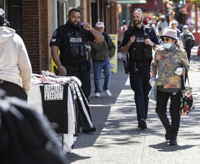 Two Vancouver police officers on foot patrol in the Downtown Eastside on Thursday. Two Vancouver police officers on foot patrol in the Downtown Eastside on Thursday.