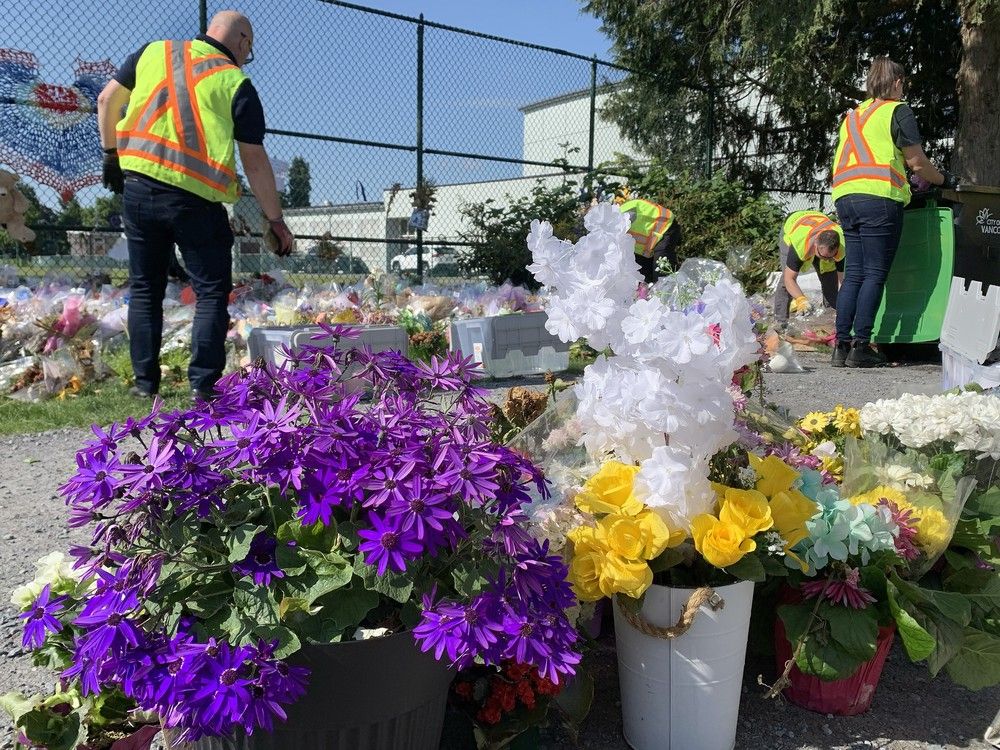 City of Vancouver workers begin to re-locate the memorial for Lapu Lapu Day festival victims at Fraser Street and 41st Avenue on May 22, 2025. City of Vancouver workers begin to re-locate the memorial for Lapu Lapu Day festival victims at Fraser Street and 41st Avenue on May 22, 2025.