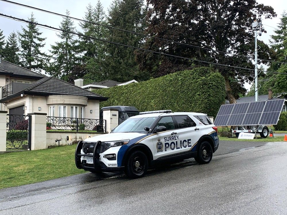 File photo of Surrey Police at a home in Panorama Ridge that was targeted by extortionists. File photo of Surrey Police at a home in Panorama Ridge that was targeted by extortionists.