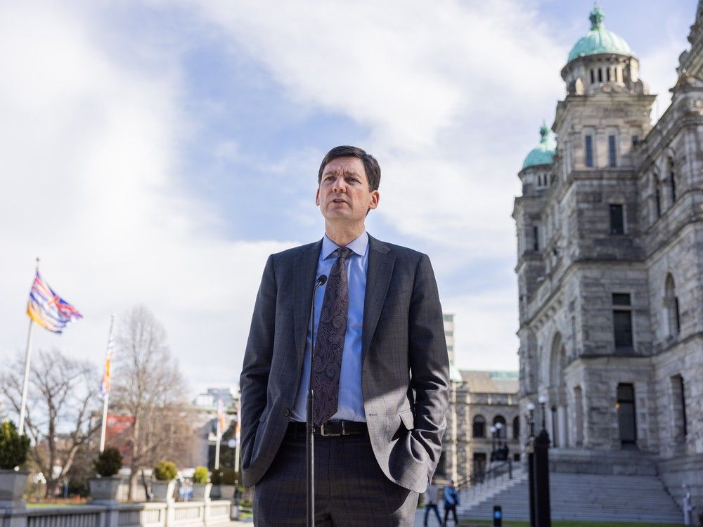Premier David Eby outside the legislature. Premier David Eby outside the legislature.