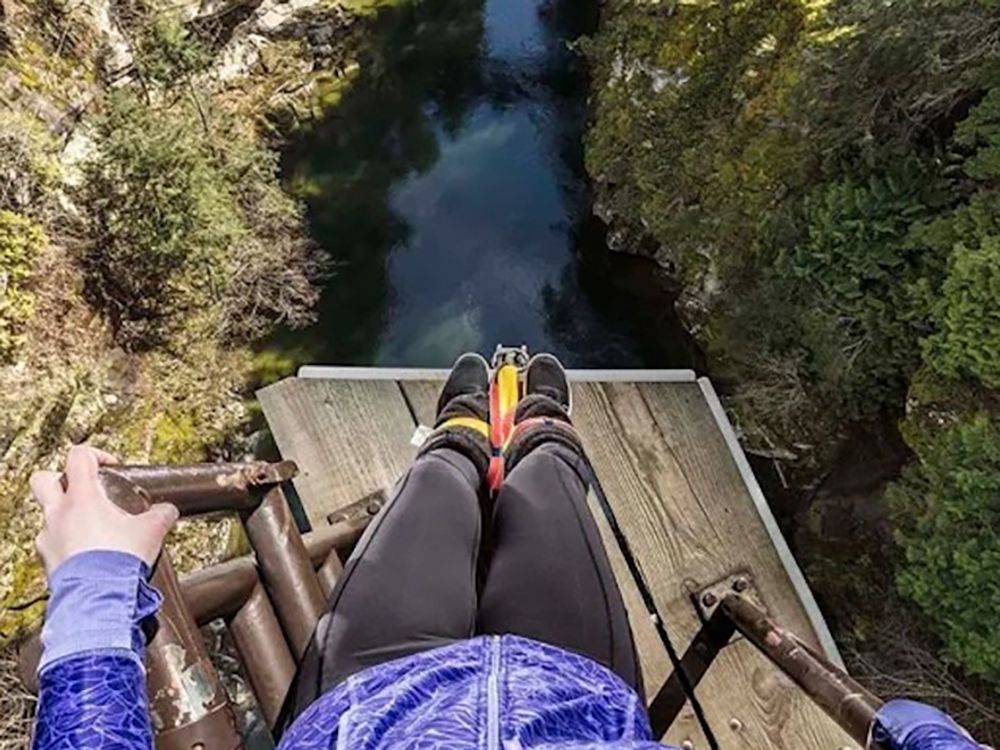 A bungee jumper readies to jump. A bungee jumper readies to jump.