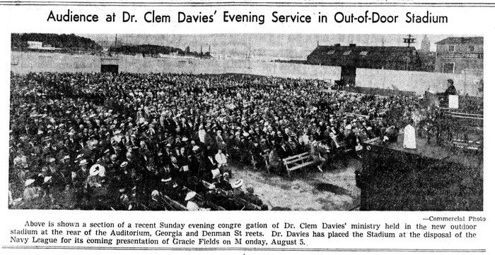  Evangelist Clem Davies lectures thousands of people in an “out-of-door stadium” on the site of the old Denman Arena in the July 20, 1940 Vancouver Sun. The Arena had been destroyed by fire in 1936, but part of its concrete walls remained, which Davies converted into a stadium for his Sunday night sermons