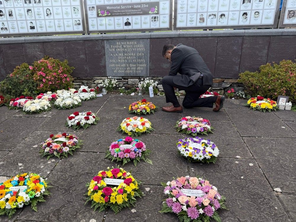 Family member bows in prayer for Air India Flight 182 victims at Ahakista, Ireland. Family member bows in prayer for Air India Flight 182 victims at Ahakista, Ireland.