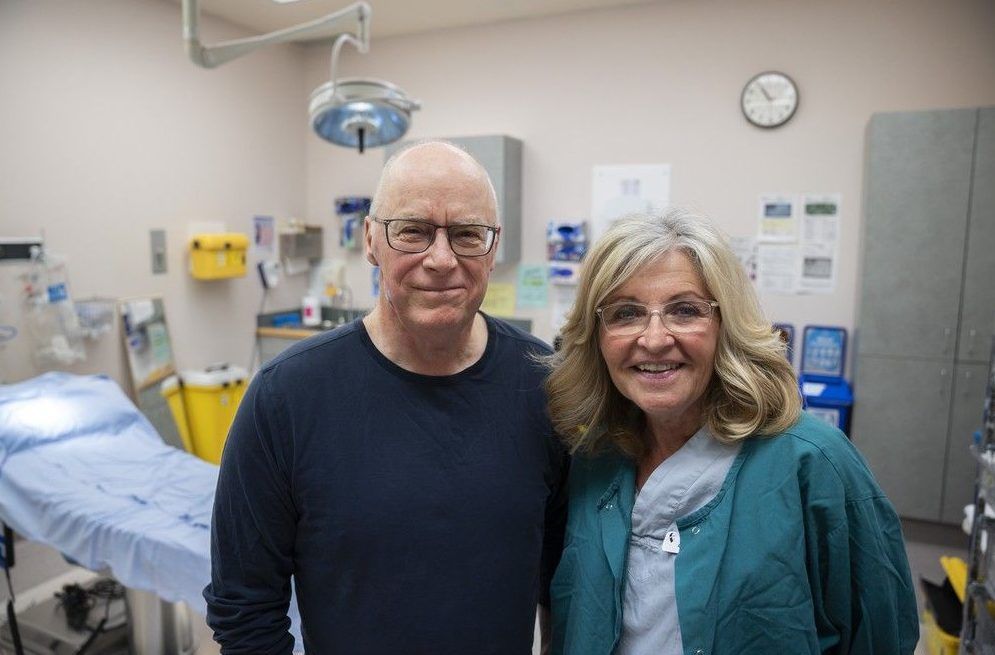  malcolm matheson, left, a patient of the facial esthetic medical tattoo program at eagle ridge hospital, with sandi saunier, right, the surgical nurse who performed the medical tattoo.