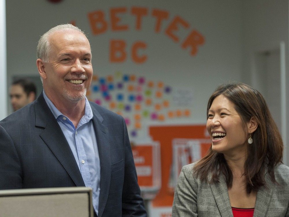 MLA Bowinn Ma is pictured in this 2017 file photo at her North Vancouver constituency office alongside former B.C. premier, the late John Horgan. MLA Bowinn Ma is pictured in this 2017 file photo at her North Vancouver constituency office alongside former B.C. premier, the late John Horgan.