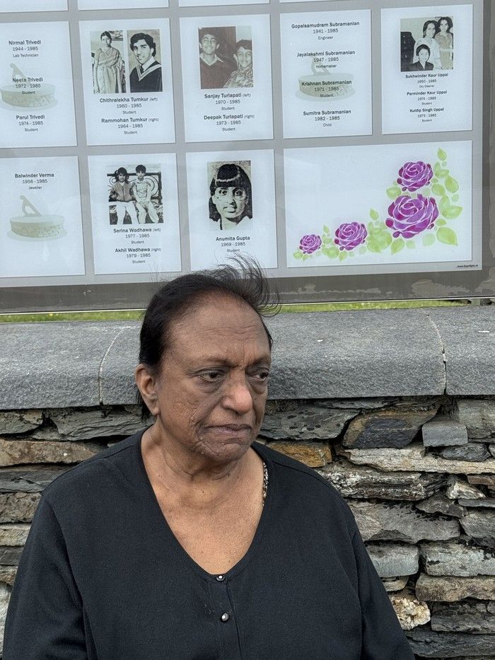 Padmini Turlapati, of Toronto, sits in front of the Air India memorial in Ahakista, Ireland, on June 21, 2025. A photo of her two dead sons Sanjay and Deepak is just above her head. Padmini Turlapati, of Toronto, sits in front of the Air India memorial in Ahakista, Ireland, on June 21, 2025. A photo of her two dead sons Sanjay and Deepak is just above her head.