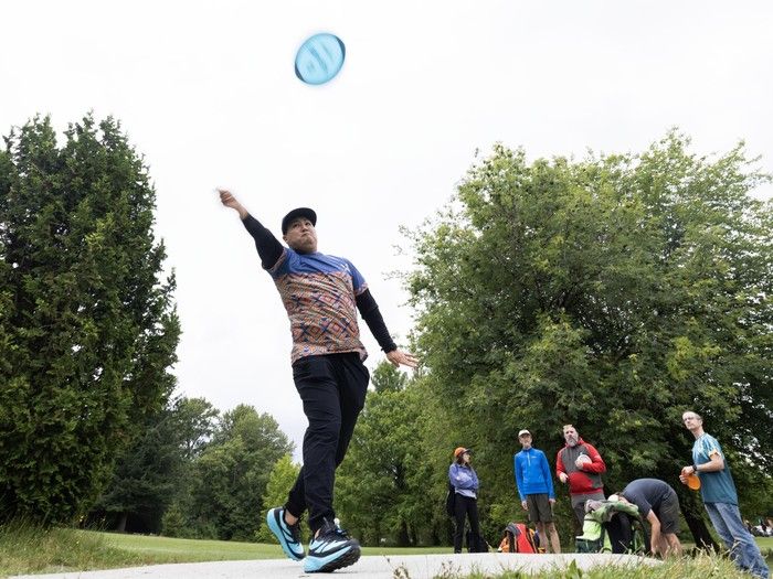 Nathan Wong plays disc golf at Queen Elizabeth Park in Vancouver. Nathan Wong plays disc golf at Queen Elizabeth Park in Vancouver.