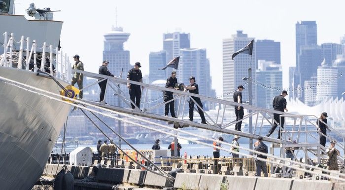 A crew loads supplies onto the HMCS Regina during Vancouver Fleet Week at Burrard Dry Dock Pier in North Vancouver on June 30, 2025. A crew loads supplies onto the HMCS Regina during Vancouver Fleet Week at Burrard Dry Dock Pier in North Vancouver on June 30, 2025.