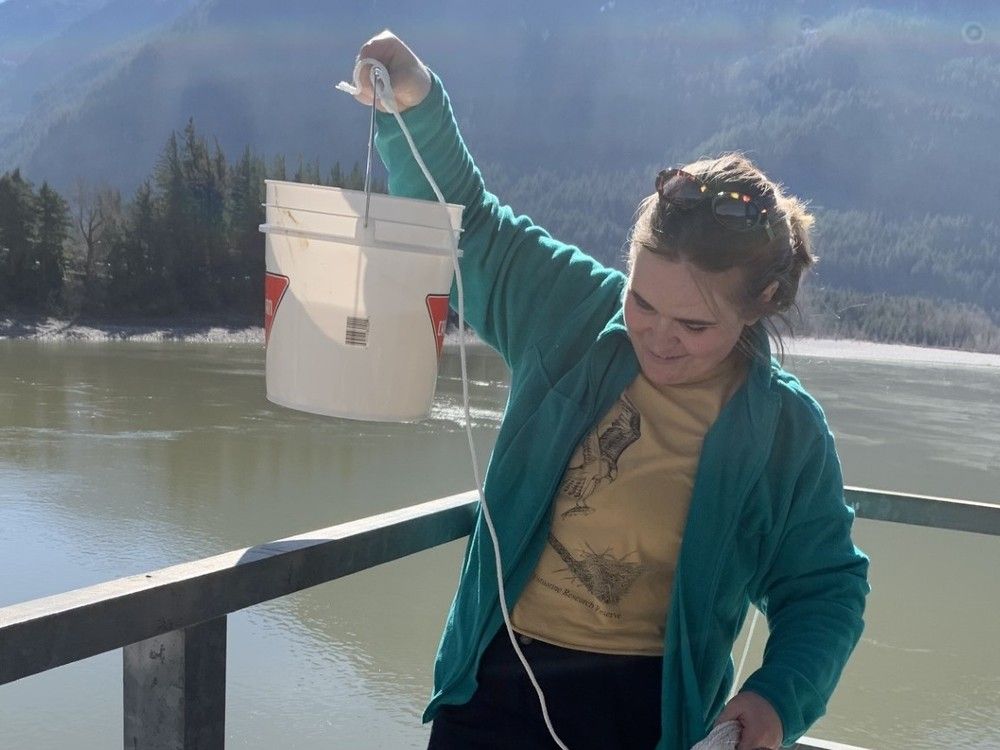  Emily Brown, a research scientist at UBC’s institute for oceans and fisheries, studies water samples from the Fraser River.