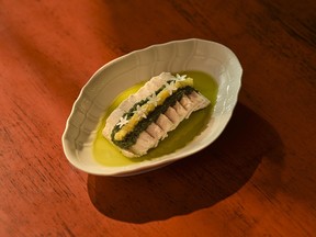 Hu Jing-style poached chicken.