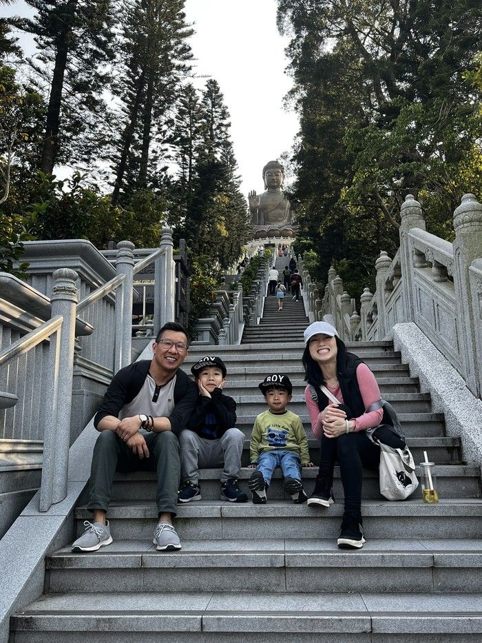  chris ho (l) with his family — sons caden and liam and wife maggie (r).