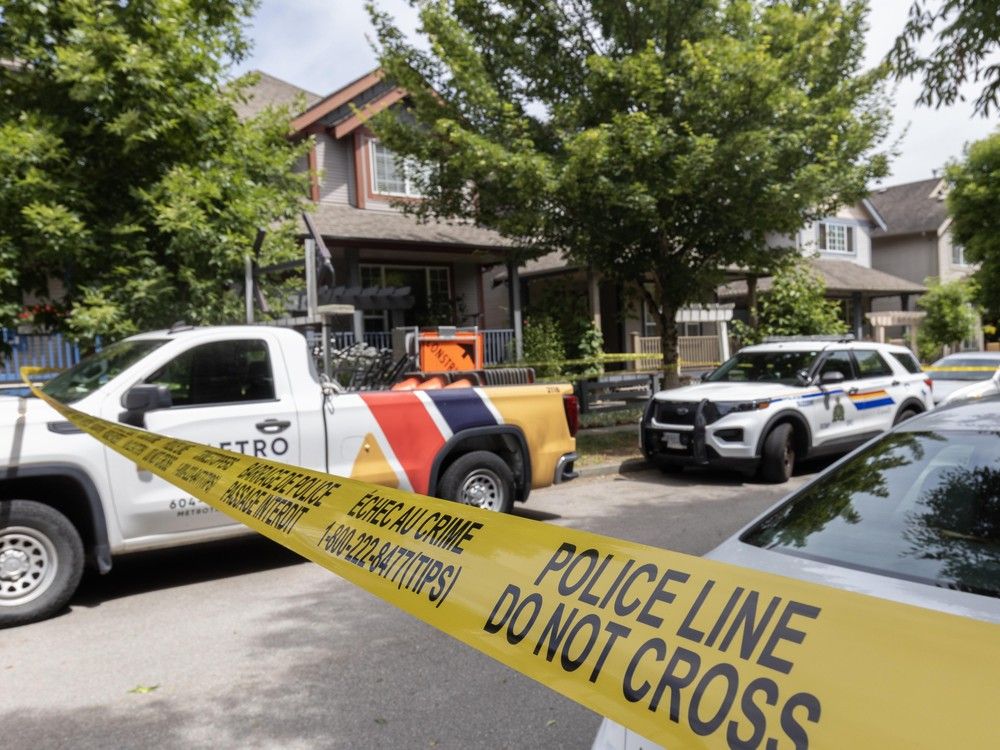 Police tape at a Surrey crime scene. Police tape at a Surrey crime scene.