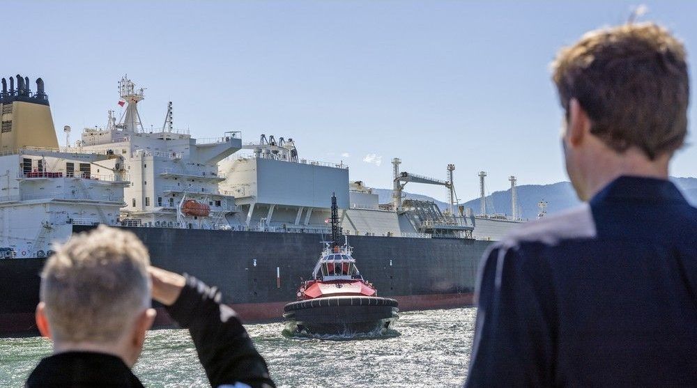  Premier David Eby (right) watches as a LNG carrier manoeuvres in Kitimat. LNG Canada, a consortium of five partners including Shell, Malaysian state-owned Petronas, PetroChina, Mitsubishi Corp. and KOGAS, is contemplating a $30-billion addition to its Kitimat plant that would nearly double its capacity to 26 million tonnes of LNG per year from 14 million tonnes per year now.