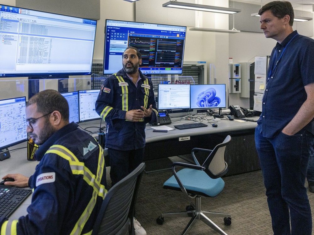 At the same time Premier David Eby was touting B.C.'s potential to export liquefied natural gas to Asia, U.S. President Donald Trump was unveiling his county's trade framework agreement with South Korea. Here, Eby tours the control room for the LNG Canada plant in Kitimat. 