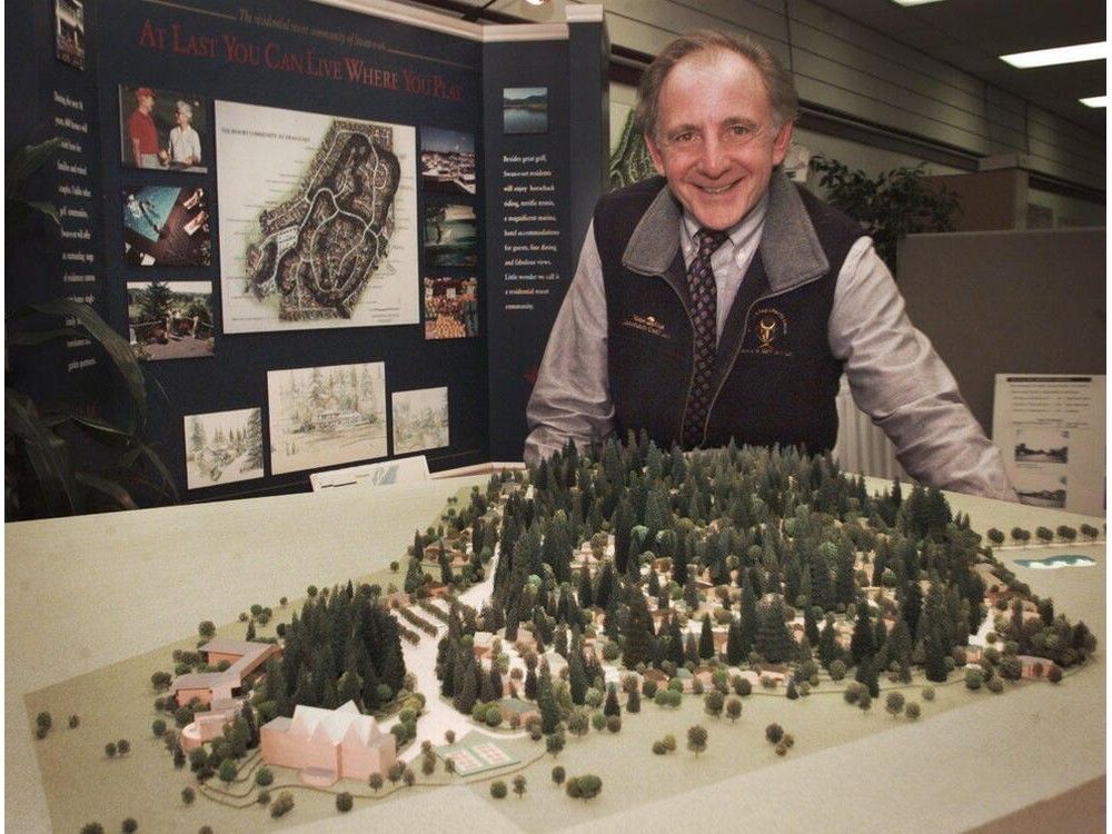 Neil Griggs, then-president of Swaneset Bay Resort, with a model of a proposed residential development adjacent to the existing golf course, in 1997.