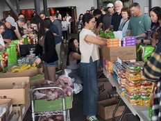 Relate Church volunteers prepare food parcels last month to distribute to needy children and families in north Surrey.