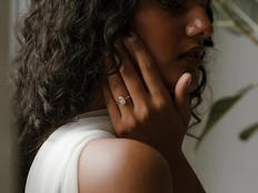A model wears an oval lab diamond bezel ring from the Vancouver engagement ring studio Ma Folie. Handout/