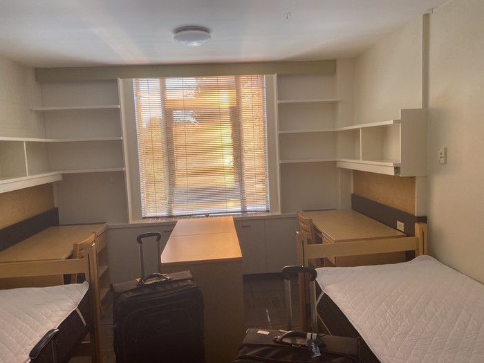  Before: Most university dorms are furnished with the basics, including bed, desk, shelving, dresser and closet.