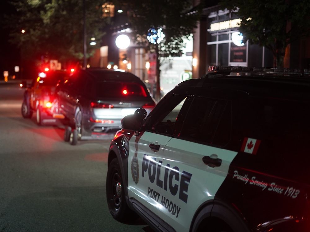  Port Moody police tow the car of a suspected impaired driver who bolted from a sobriety check on Friday.