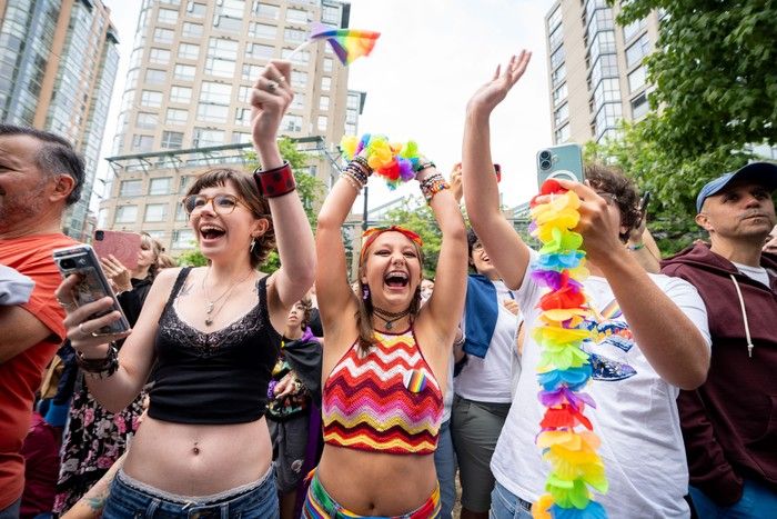 People cheer as Prime Minister Mark Carney marches during the Vancouver Pride Parade in Vancouver, on Sunday, Aug. 3, 2025. People cheer as Prime Minister Mark Carney marches during the Vancouver Pride Parade in Vancouver, on Sunday, Aug. 3, 2025.