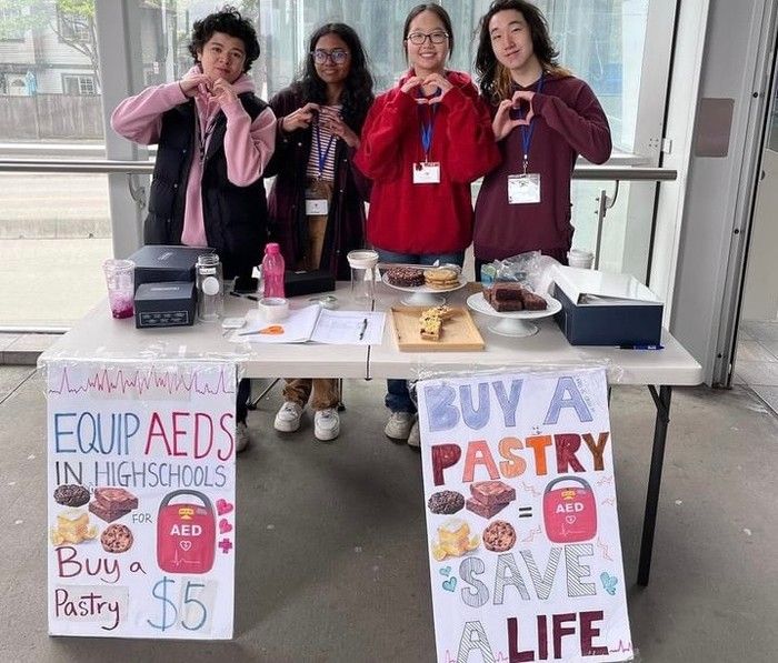  Point Grey students Ethan Balagtas, Shanjanaa Ramkumar, Vivian He, and Ryan Wang raise money to buy AEDs for Vancouver schools. Photo courtesy: Tobias Zhang