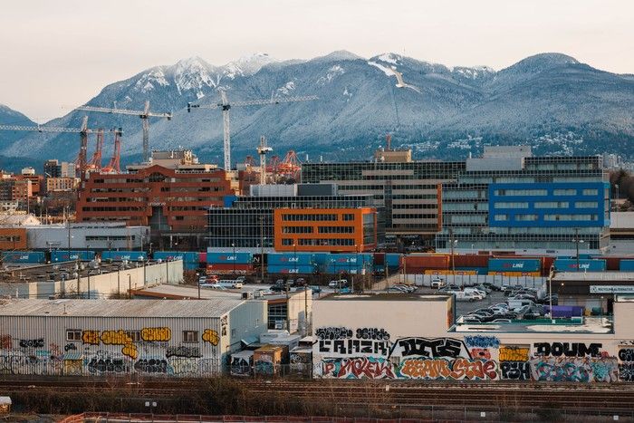  Photographer Ian Kobylanski’s condo near Emily Carr University offers a great view of the Vancouver skyline and the North Shore Mountains.