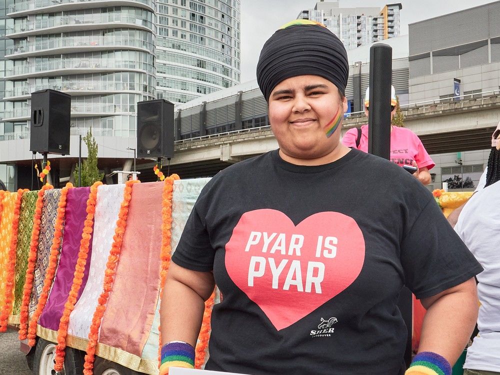  angit modaher, program coordinator with sher vancouver, a south asian lgbtq+ non-profit, at the vancouver pride parade on aug. 3, 2025.