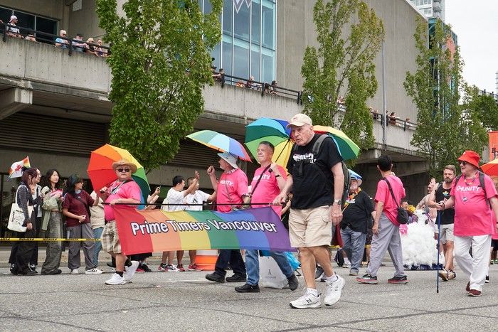  crowds and performers at the vancouver pride parade on aug. 3, 2025.
