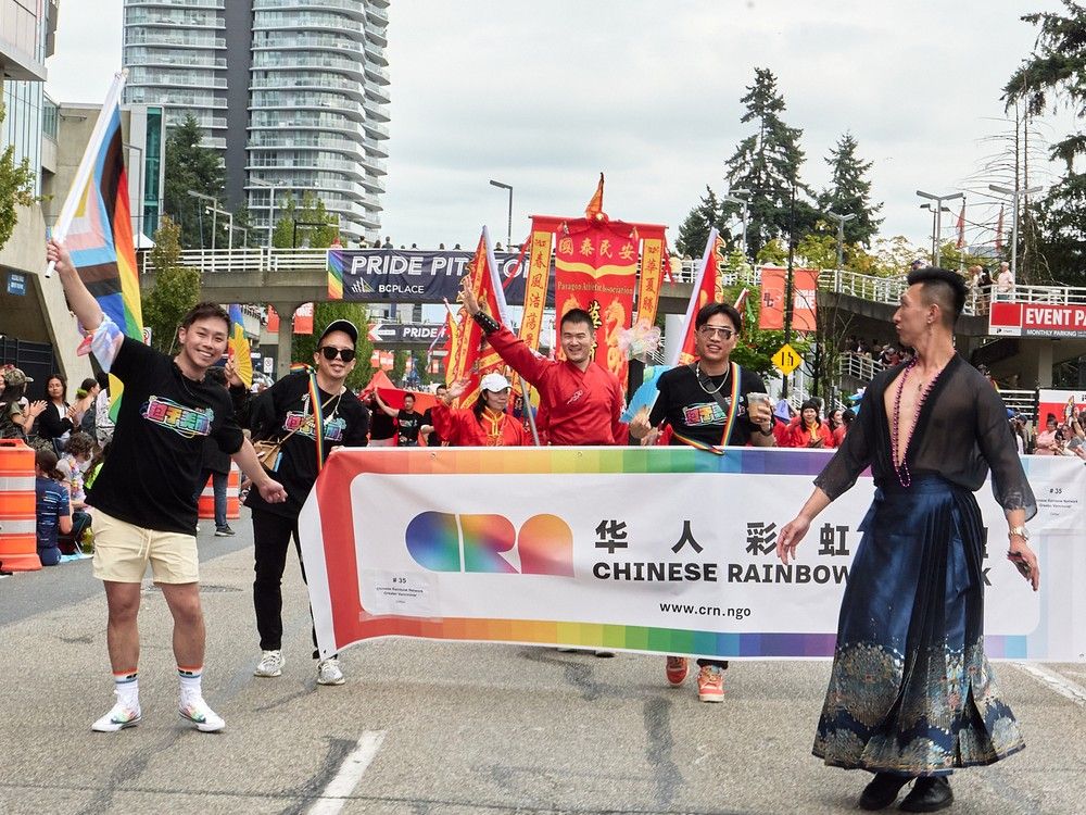  members of the chinese rainbow network at the vancouver pride parade on aug. 3, 2025.
