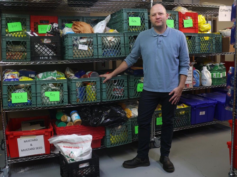  Dan Huang-Taylor, executive director of Food Banks B.C., inside a food bank in Port Moody.