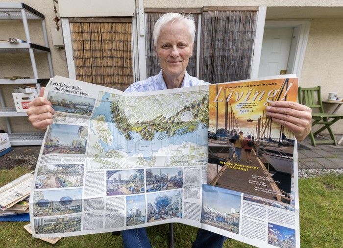  David Rogers with a fold-out about B.C. Place and a Concord Pacific magazine, Living!