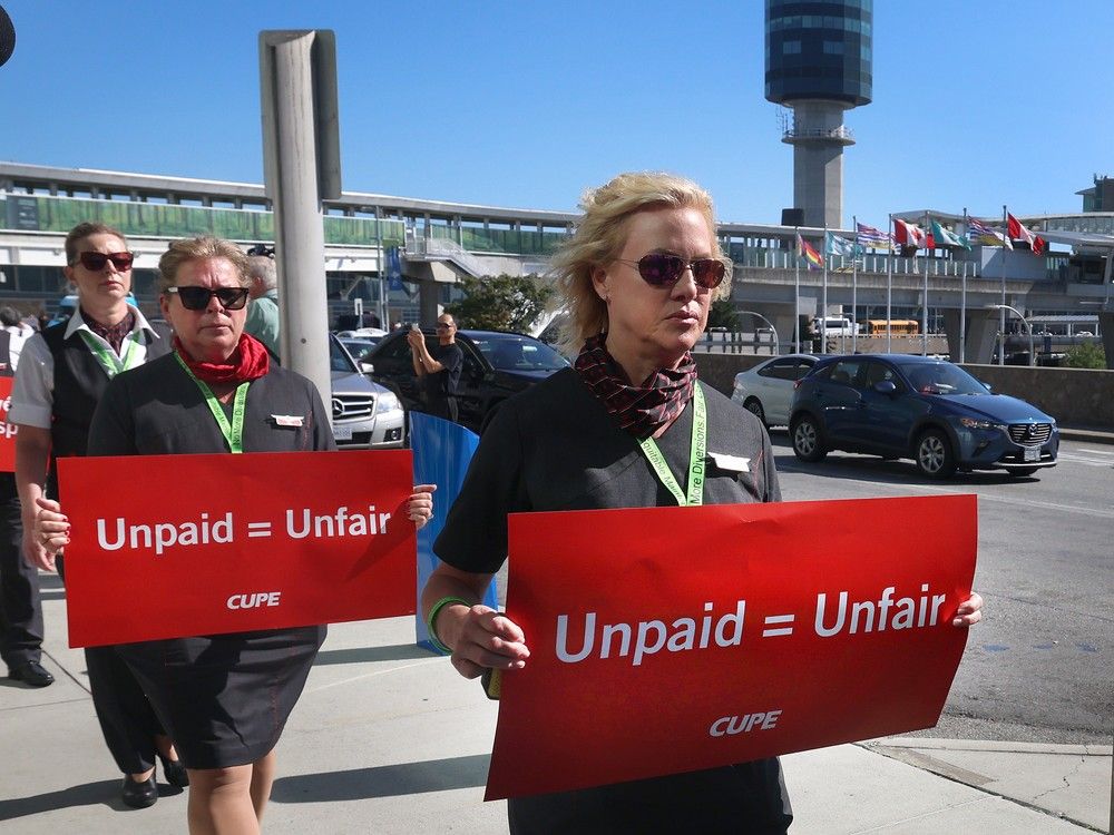  Air Canada flight attendants picket at Vancouver International Airport (YVR) on Aug. 11, 2025.
