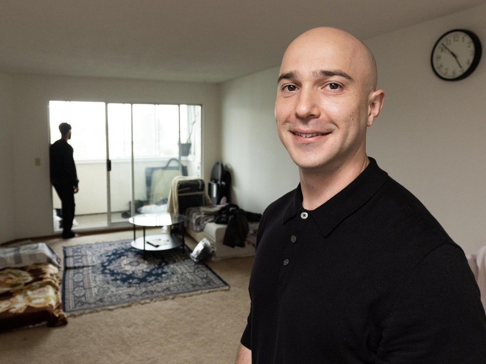Realtor Noah Natovitch, foreground, with Mandeep Kang at Kang's home in Surrey. Realtor Noah Natovitch, foreground, with Mandeep Kang at Kang's home in Surrey.