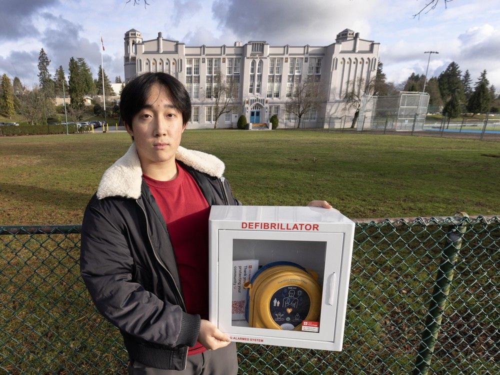Tobias Zhang with an AED at Point Grey Secondary