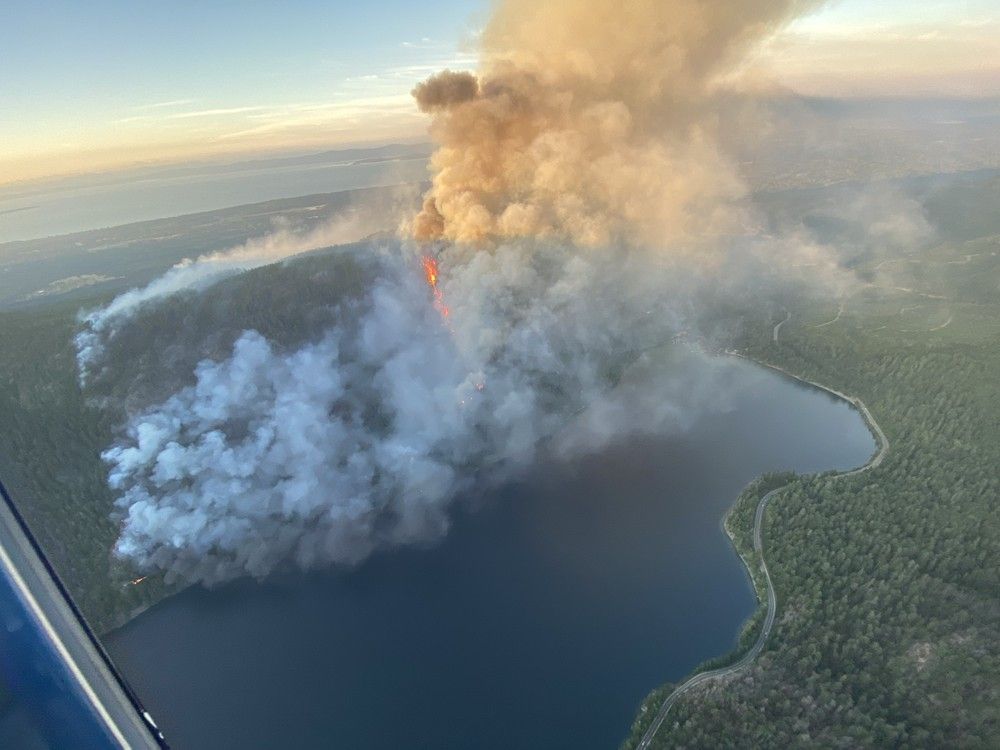  Fire crews worked through Saturday night to battle the growing wildfire on Vancouver Island that has led to the evacuation of nearly 400 properties. Photo credit: B.C. Wildfire Service