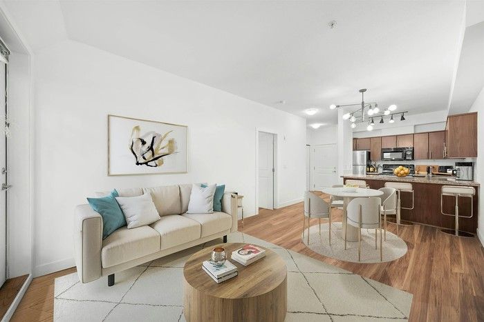  Unit has laminate floors and granite countertops in the kitchen.