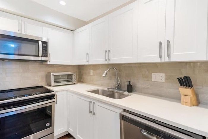  This condo is in a quiet residential pocket of Port Coquitlam’s Glenwood neighbourhood.