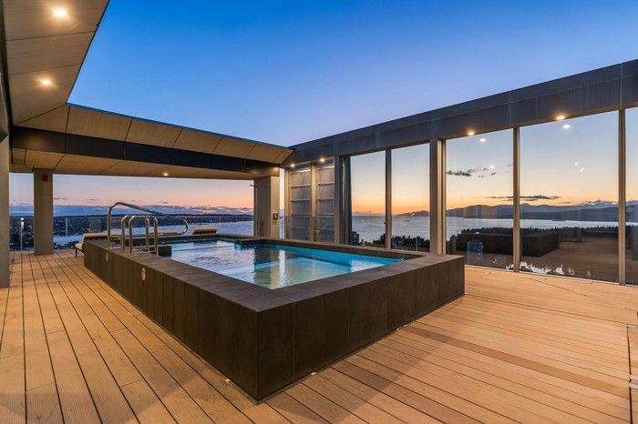  Terrace railing glass is made with minimal profile metal caps for seamless views.