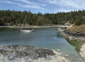 The forest trails at Smuggler Cove Marine Provincial Park leads to a rocky bluff that was once a rum-runner's hideaway.