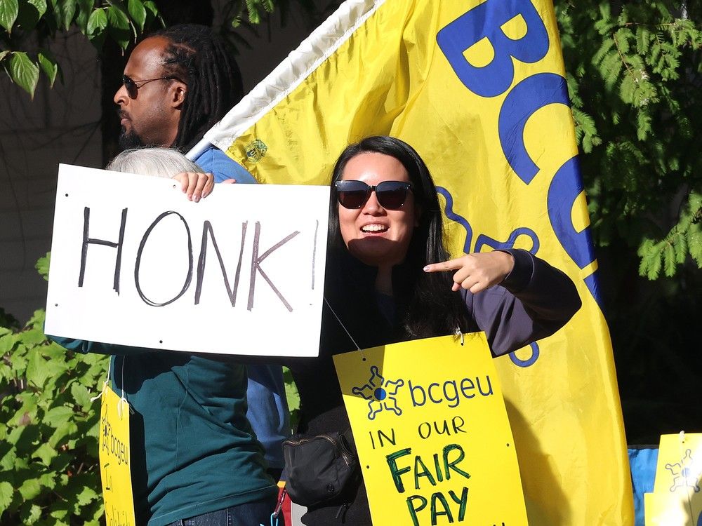  bcgeu workers on a picket line at the b.c. liquor distribution branch office at 3383 gilmore way during their dispute with the b.c. government in burnaby on sept 23, 2025.