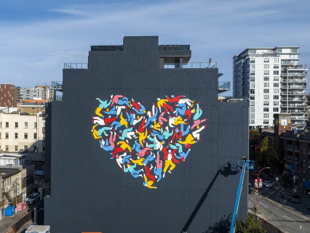 A new mural on the side of the Keefer House in Chinatown. Humanity Heals was created by artist Rory Doyle as a declaration of solidarity in a neighbourhood defined by hardship and resilience. A new mural on the side of the Keefer House in Chinatown. Humanity Heals was created by artist Rory Doyle as a declaration of solidarity in a neighbourhood defined by hardship and resilience.