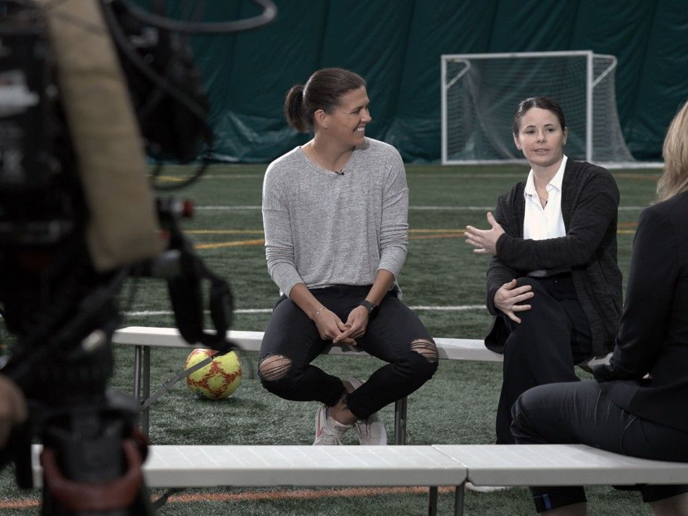 Former Canadian teammates Christine Sinclair and Diana Matheson are seen here in a behind the scenes shot from the new soccer documentary The Pitch. The film looks at the founding of the Canada's first women's professional soccer league Northern Super League., Former Canadian teammates Christine Sinclair and Diana Matheson are seen here in a behind the scenes shot from the new soccer documentary The Pitch. The film looks at the founding of the Canada's first women's professional soccer league Northern Super League.,